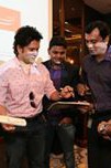sachin giving autograph to mohit